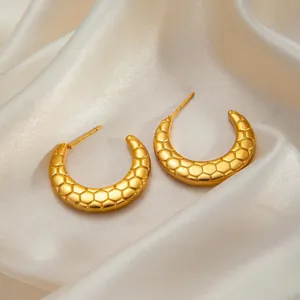 Titanium steel golden C-shaped twisted earrings with a unique honeycomb geometric texture