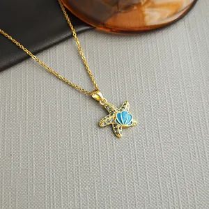 Starfish pendant necklace with blue diamonds and enamel shell on a golden chain