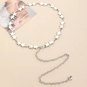 Detailed macro view of silver star-shaped metal waist chain with lobster clasp and extender