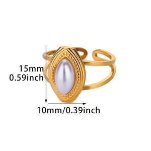 Detailed view of marquise faux pearl ring with milgrain edge and 15mm size dimensions