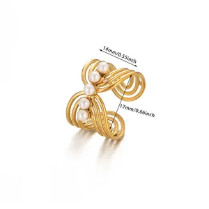 Detail showing dimension of multilayer gold ring with faux pearls and open band design