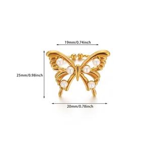 Detailed view of golden butterfly ring with pearls and precise size measurements