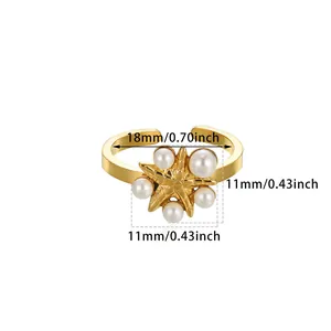 Detailed view of gold hex star ring with pearls and 18mm adjustable opening size