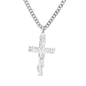 Detail of silver cross pendant with a unique branch-like cutout and micro-set zircons