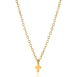 Polished gold cross pendant necklace featuring a classic O-link chain on white background