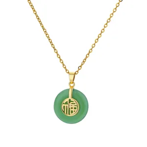 Close-up of golden titanium necklace with green stone pendant and Chinese Fu character
