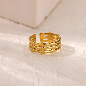 Minimalist 18K gold plated stainless steel ring with triple layered bamboo texture design