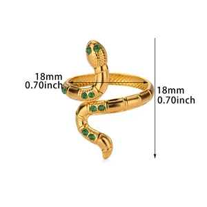 Vintage gold snake ring with green zircon stones and 18mm diameter measurement