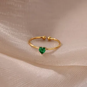Detail shot of heart-shaped green zircon set on 18K gold-plated stainless steel open ring