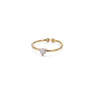 Macro detail of 18K gold plated stainless steel ring with heart shaped zircon crystal
