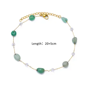 Detail view of gold stainless steel anklet with green stones and length label