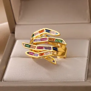 Detailed close-up of multi-layer gold-plated ring featuring colorful rectangular zircon stones