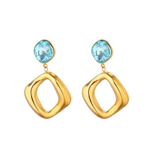 Boucles d'oreilles géométriques vintage avec carrés dorés et pierres bleues