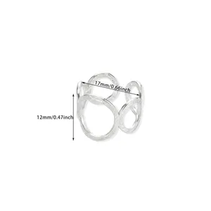 Detailed view of silver irregular geometric open ring with hammered texture and dimensions