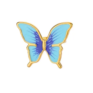 Detail of colorful butterfly ring with gold plating and blue-purple enamel finish