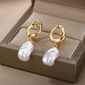 Elegant 18K gold-plated irregular geometric rings with baroque pearl drop earrings in a box