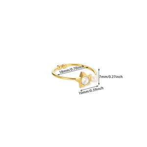 Detailed view of adjustable gold star and pearl ring with white zircon inlays and dimensions
