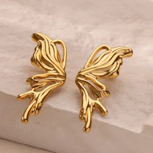 Y2K vintage golden butterfly wing earrings with textured lava design and metallic finish
