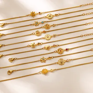 Bracelets en acier titane doré avec breloques florales, pierres de naissance et zircons