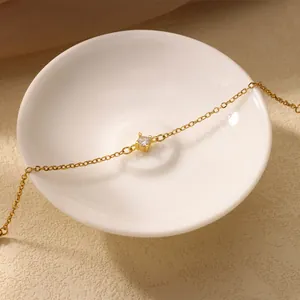 Minimalist 18K gold plated chain bracelet with a single zircon in four-prong setting