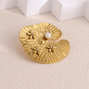 Elegant gold lotus leaf brooch with delicate flowers and white pearl accent for women