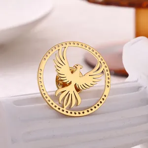 Luxurious gold stainless steel eagle brooch with Phoenix tail design and hollow circular frame