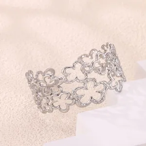 Silver hollow flower open cuff bracelet with hammered metal finish for women