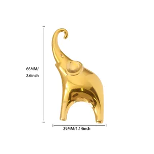 Polished gold elephant ornament showing dimensions of 66mm height and 29mm width