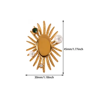 Detailed view of sunburst pearl brooch with green stone and dimensions 45mm x 30mm