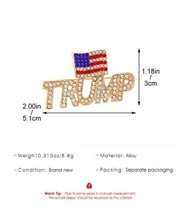 Detail view of Trump alloy brooch with rhinestones and US flag including dimensions