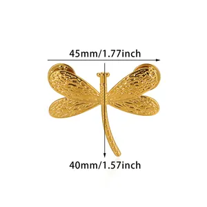 Golden dragonfly brooch with hammered texture wings and dual butterfly clasps, 45mm width