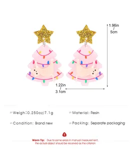 Detailed view of pink Christmas tree cat earrings with dimensions 5cm height and resin material