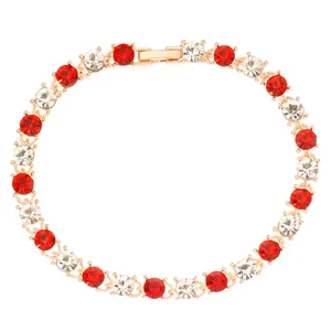 Bracelet coeur coloré avec pierres précieuses rouges et blanches sur monture dorée