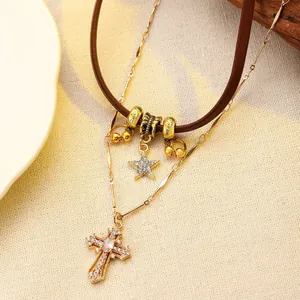 Double-layer star and cross necklace with brown leather choker and gold plated chains