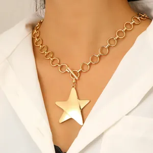 Golden chunky chain necklace with a large star pendant and OT toggle clasp closure