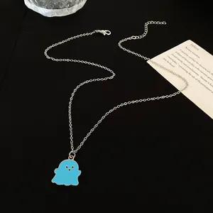 Detail of blue cartoon ghost pendant with silver chain and adjustable lobster clasp