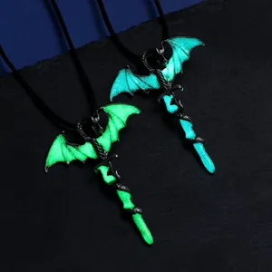 Gothic bat wing dagger pendant necklace with glowing green and blue luminous effect