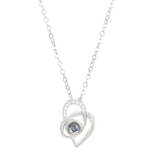 Silver heart projection necklace with I love you engraving and pavé set cubic zirconia