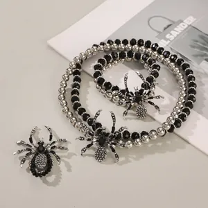 Gothic spider jewelry set with sparkling rhinestones and black beads for Halloween