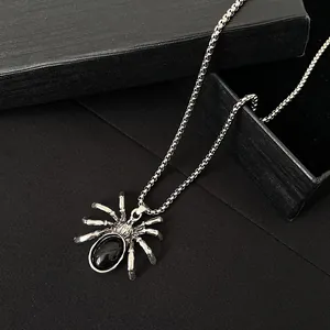 Gothic spider necklace with black gemstone and vintage silver box chain detail