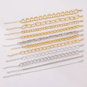 Detail of diverse punk alloy chain bracelets with lobster clasps and extension links