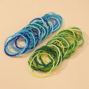 Handmade gradient bead bracelet set with blue and green bohemian style layering