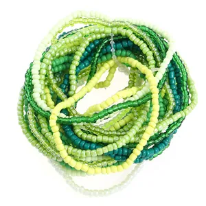 Handmade elastic bracelet set with gradient green seed beads in a stylish stackable design