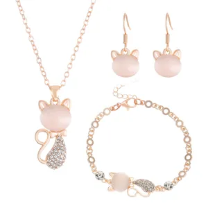 Rose gold plated jewelry set featuring opal cat necklace, earrings and bracelet with rhinestones