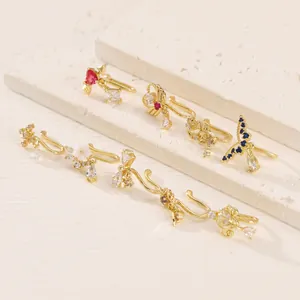 Gold plated U-shaped nose clips set with zircon stones in heart and floral designs