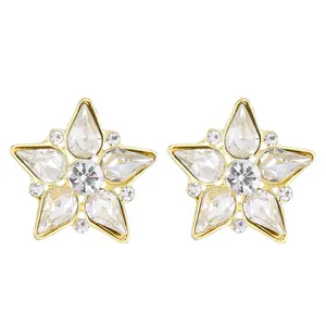 Elegant gold star stud earrings with teardrop crystals and brilliant rhinestone pavé