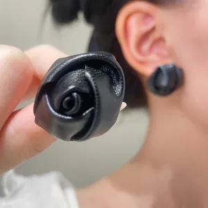 Vintage 3D black PU leather rose flower stud earrings with handcrafted floral texture