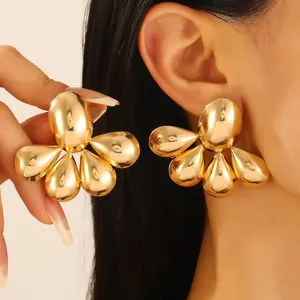 Golden cluster stud earrings with polished drop charms and high mirror finish