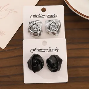Vintage 3D PU leather rose flower stud earrings set in silver and black finish