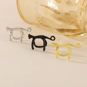 Detailed view of cat-shaped ear cuffs in silver, black and gold plated finishes